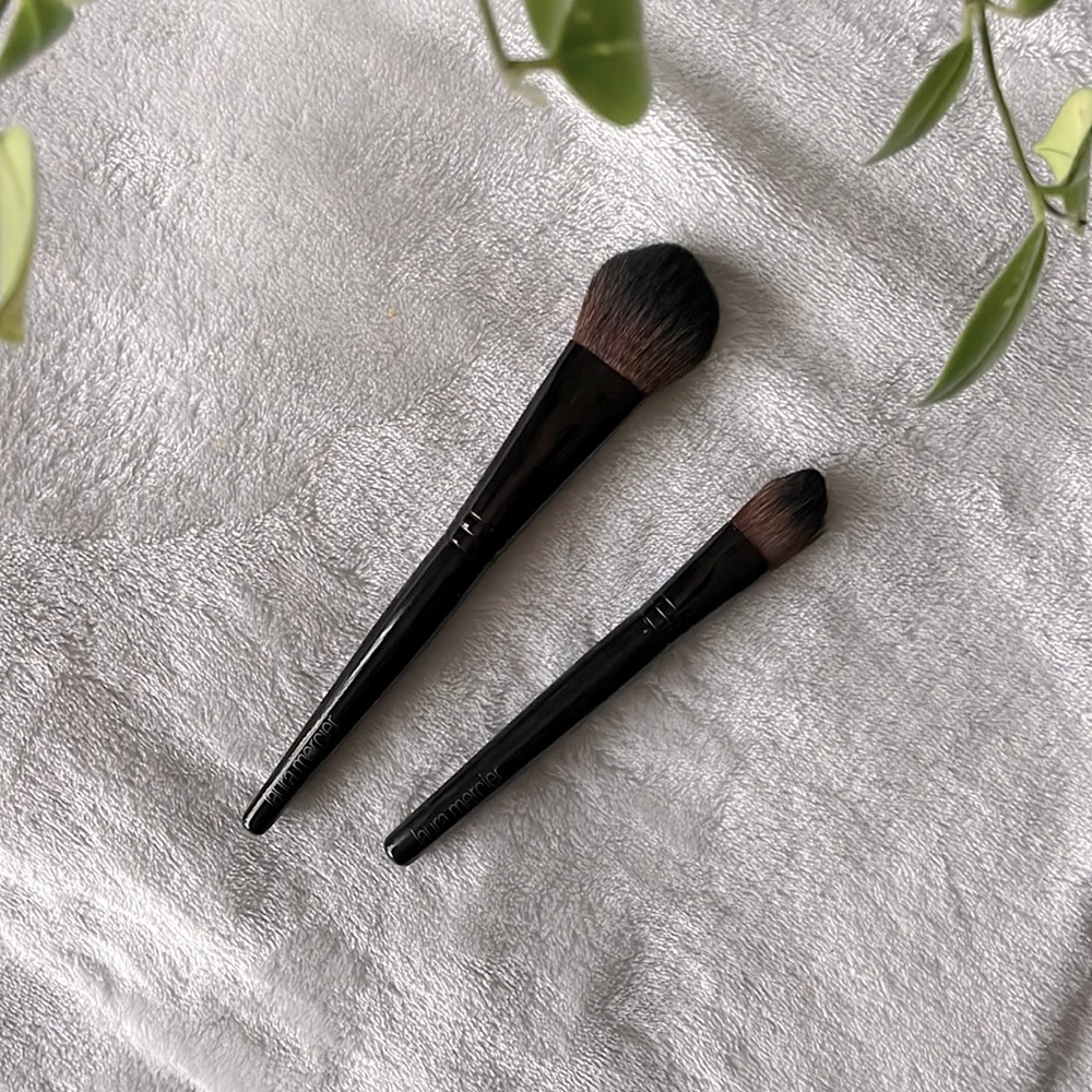 Two Laura Mercier makeup brushes